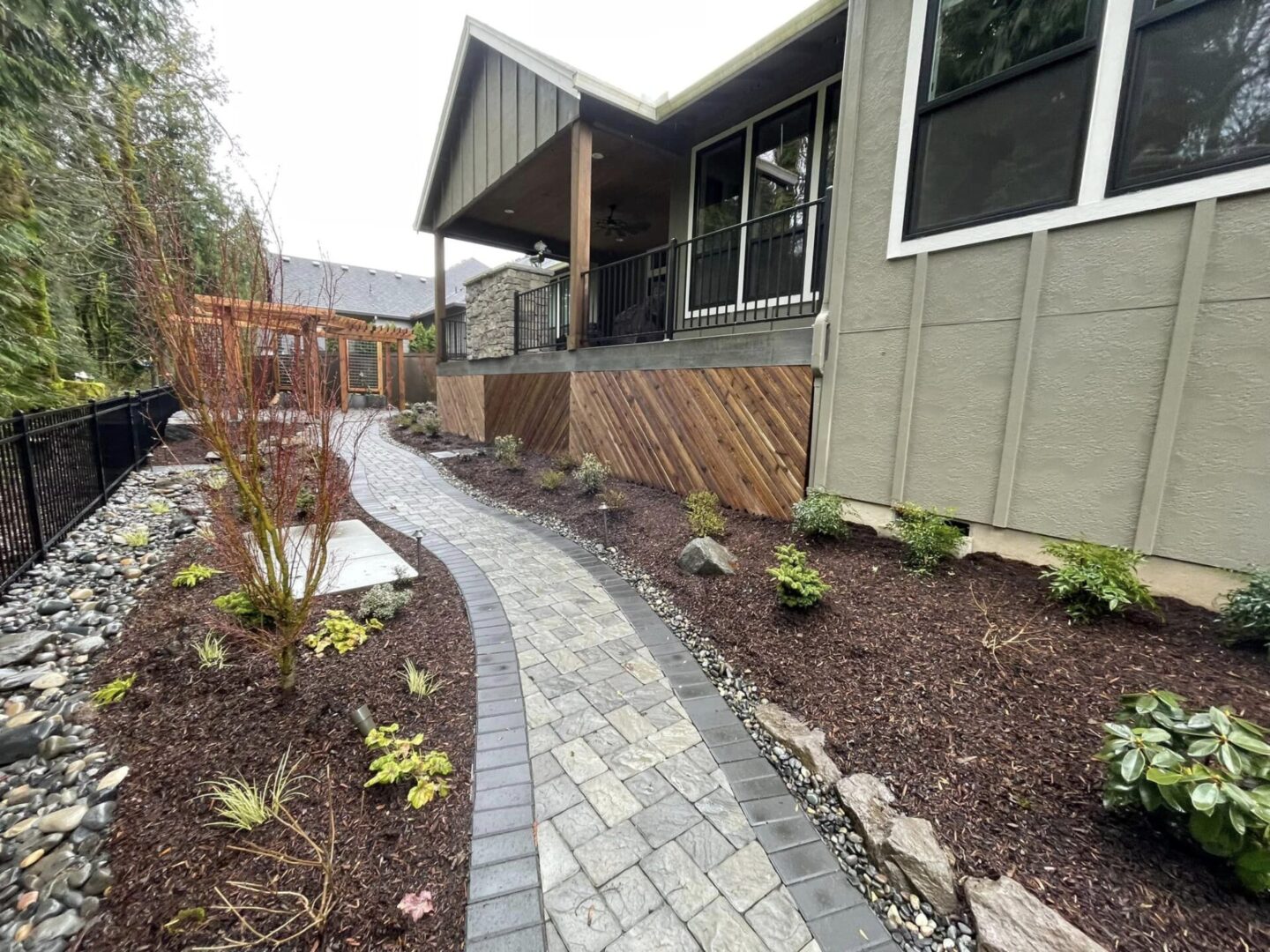 A walkway is shown in the middle of a garden.