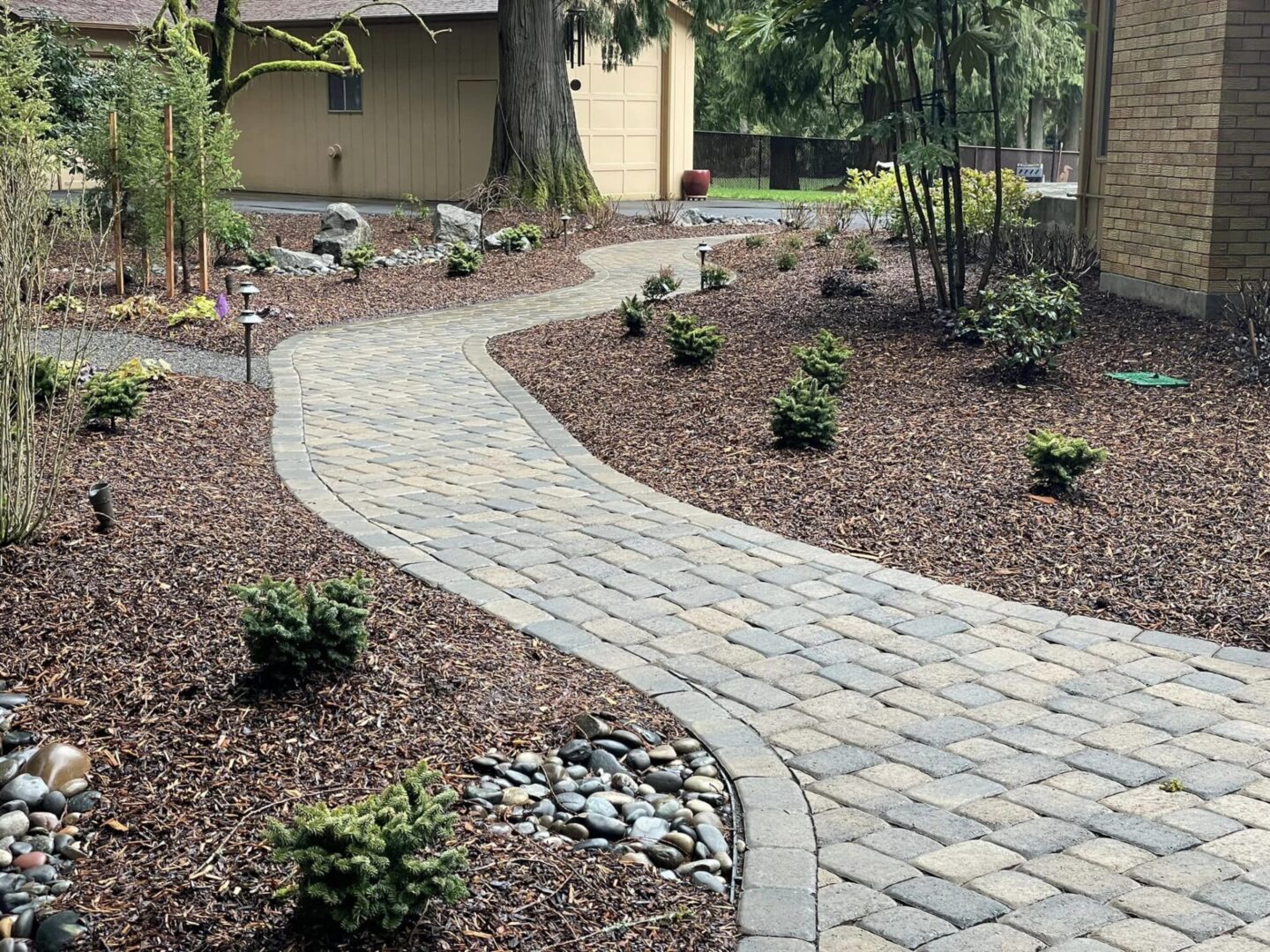 A walkway in the middle of a garden.