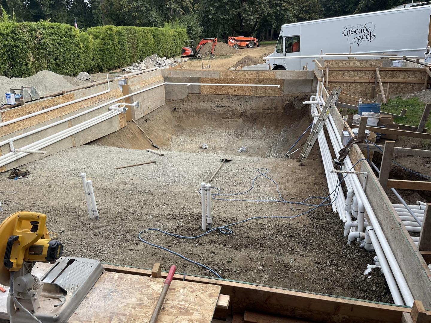 A pool being built with concrete and wood.