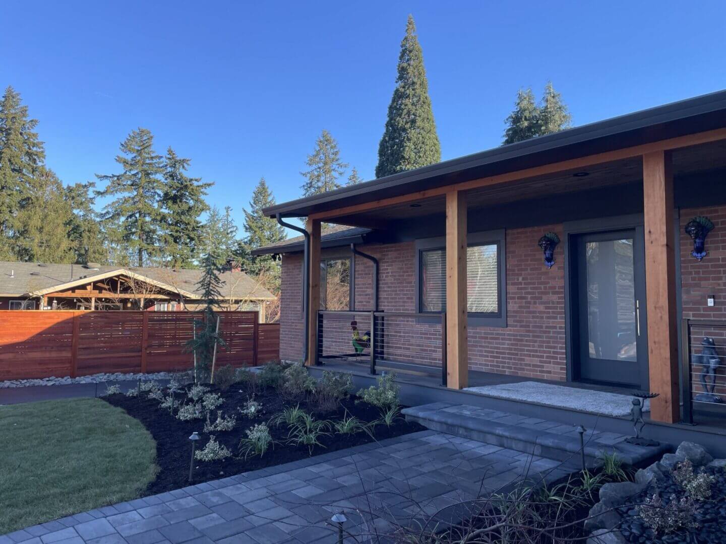 Brick house with garden and patio.